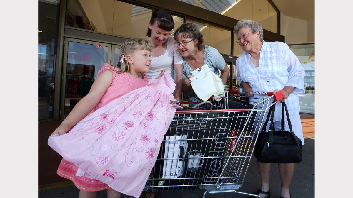  Allaynah Blazely-Fox, 6, from Wodonga, with a new dress, with her mother Seona Blazely-Fox from Wodonga and her sister Petrina Tebbs from Seymour and their mother Gwen Blazely from Wodonga. PICTURE: Kylie Esler.