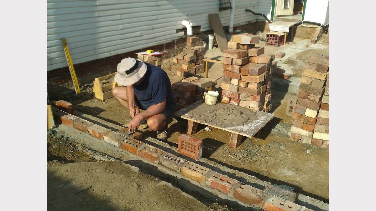 My Dad doing the brickwork for our extensions. Joanne Byron.