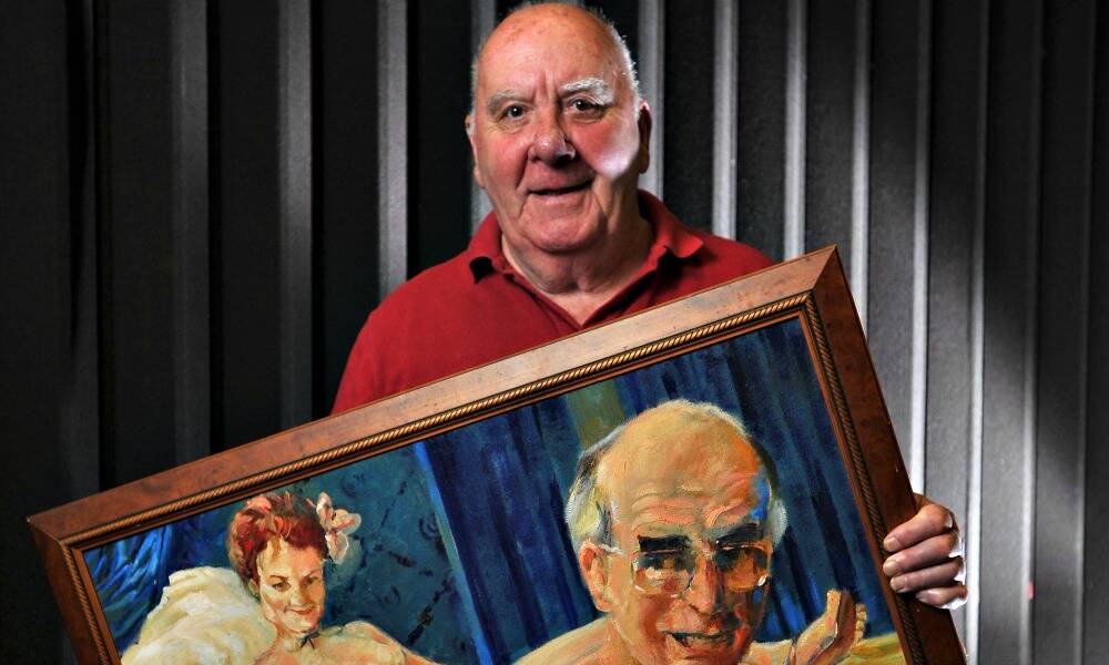 Peter Batey with the winning entry from the 1997 Bald Archy contest. Click or flick across to take a close look at the painting. Picture: DAILY ADVERTISER