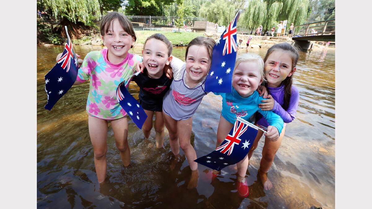 Ainsley Randell, 7, Georgia Quinton, 6, Amelia Robertson, 7, Ashlee Smith, 6, Rhianna Quinton, 5, all of Wodonga, cool off in Morses Creek, central Bright. PICTURE: John Russell.
