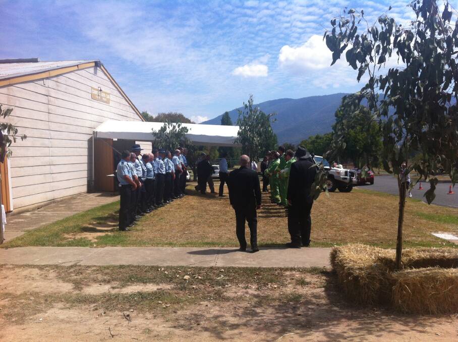 A guard of honour is formed by officials at Steven Katar's memorial. Picture: TAMMY MILLS.