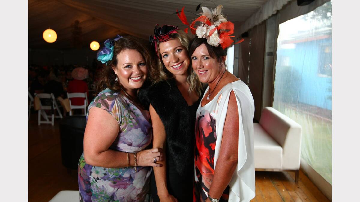 Tierre McCormack, of Wirlinga, Skye Sears, of Thurgoona, and Suzi West, of Wirlinga, attend the Wewak St School fundraiser at the Albury Gold Cup Carnival.
