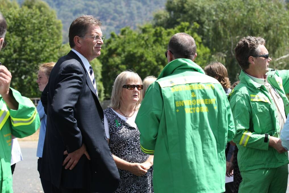 Victorian Premier Ted Baillieu joined Opposition leader Daniel Andrews as part of a guard honour which also included Katie's fellow DSE firefighters. Picture: BEN EYLES.