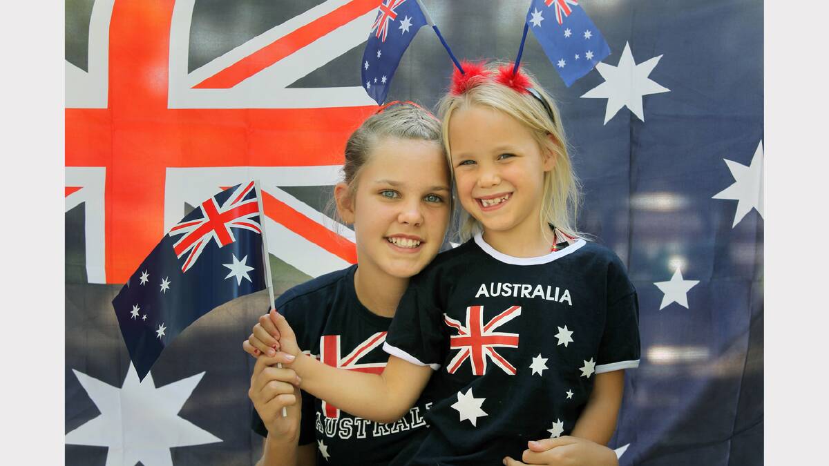 Noreuil Park, Australia Day Ceremony 2013, sisters Tegan Holroyd, 13, and Keely Holroyd, 6, of Thurgoona. PICTURE: Tara Goonan.