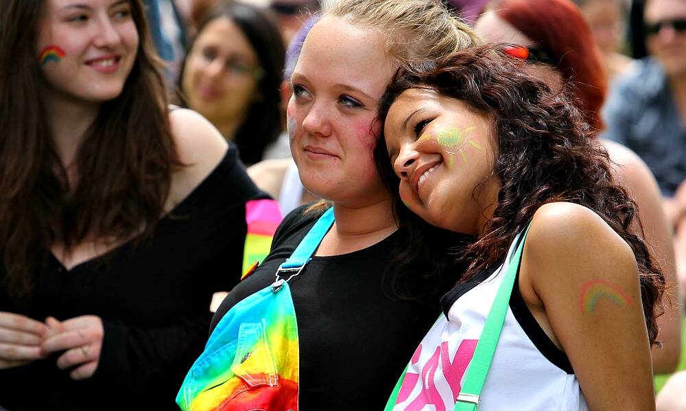 Morgan Howe, 15, of Mullengandra, and Latna Williams, 15, of Thurgoona, show their support at the Equal Love Rally held in QEII Square, Albury, on Saturday. PICTURE: Matthew Smithwick.
