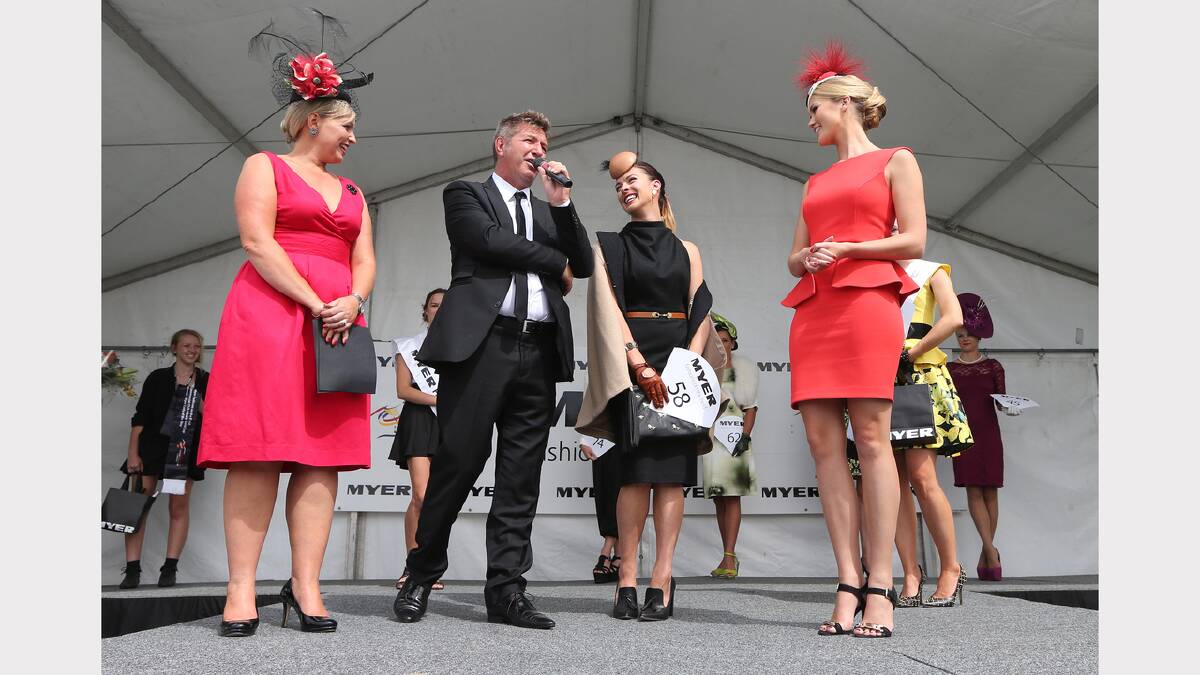 Fashions on the Field host Louise Arnold, designer and judge Wayne Cooper, runner-up Bobbi Edwards wearing a Wayne Cooper dress and former Miss Universe and judge Scherri-Lee Biggs.