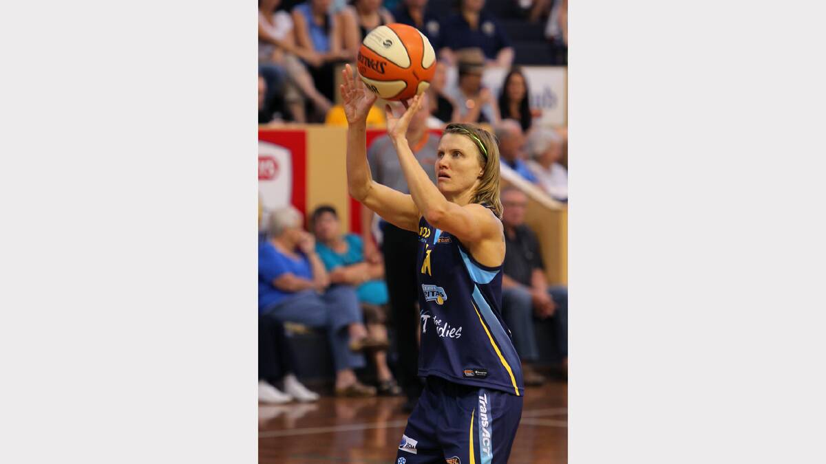 Former Lady Bandits player and current Canberra player, Jessica Bibby shoots a free throw during the WNBL match between Canberra Capitals and Bendigo Spirit at the Lauren Jackson Sports Centre. PICTURE: Matthew Smithwick.