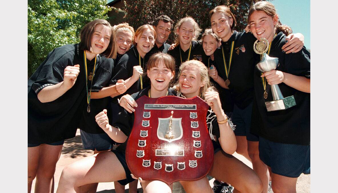 Lauren Jackson (fourth from right, back row) celebrates Murray High School's 1996 victory in the national schools basketball tournament.