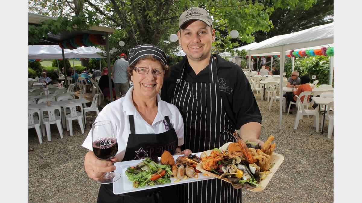 LA DOLCE VITA: Nonnna Josie Politini cooked up a traditional Italian storm at Politini Wines, and was joined by Adam Pizzini, of Rinaldo's Casa Cucina, who made his seafood specialties for the hungry crowd.