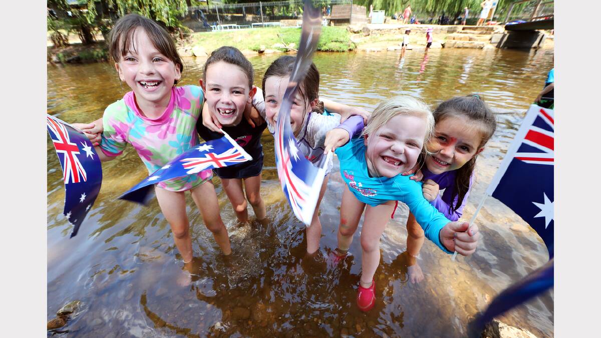 Ainsley Randell, 7, Georgia Quinton, 6, Amelia Robertson, 7, Ashlee Smith, 6, Rhianna Quinton, 5, all of Wodonga, cool off in Morses Creek, central Bright. PICTURE: John Russell.