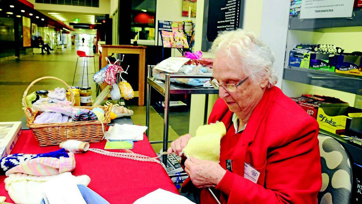 ORANGE Elizabeth Hocking has been knitting for the Orange Hospital Auxiliary for the last 15 years and says she understands how the Prime Minister would find it relaxing. Picture: Steve Gosch