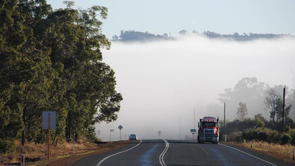 Vehicles enter and leave a thick bank of fog near Donnybrook. Photo: Donnybrook-Bridgetown Mail.