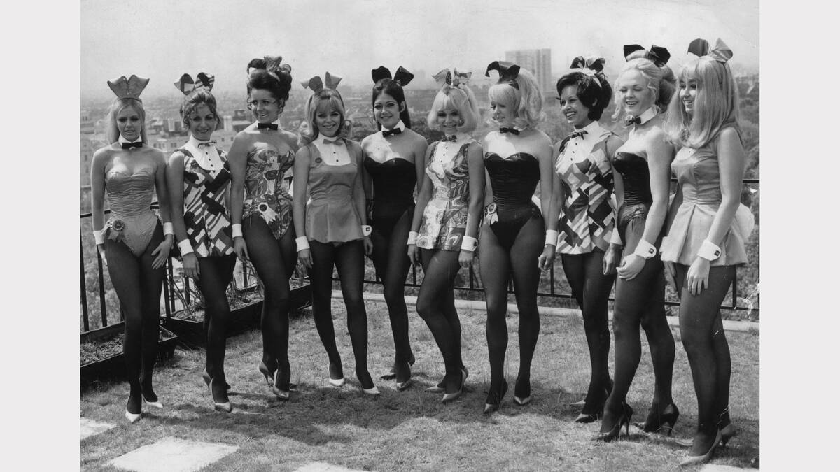 22nd June 1976:  Bunny Girls in costume pose on the roof of the Playboy Club, London.