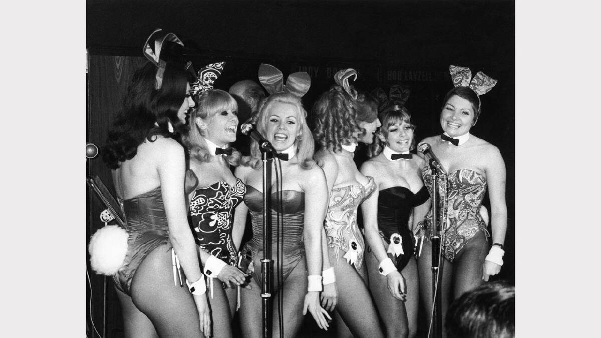 The 'Singing Bunnies' - Bunny Girl waitresses at the London  Playboy Club - perform a song during the club's 'Showtime In The Playroom' spot, circa 1972. The group have recorded an album and are, left to right: Elaine Tulley, Heather Colne, Rosemary Lamb, Julie Ann Smith, Jo Anne Wigley and Karen Parkinson.