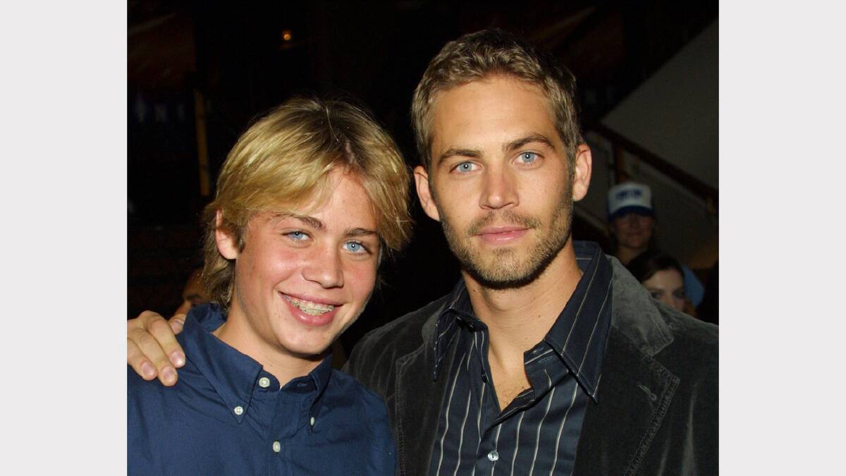  Cody Walker with his brother actor Paul Walker pose during the film premiere of "Timeline" at the Mann's National Theatre on November 19, 2003 in Westwood, California. 
