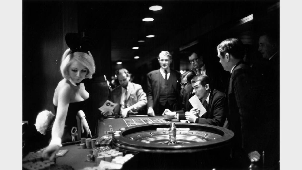 20th December 1967:  A bunny girl croupier at the Playboy club supervises a roulette wheel. 