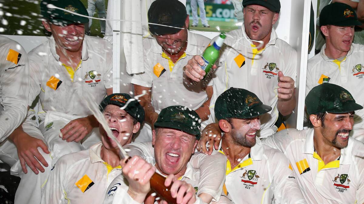The Australian team celebrates victory in the change rooms. Picture: GETTY IMAGES