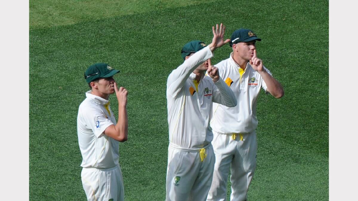 Australian players hush the Barmy Army after Mitchell Johnson dismissed Jonny Bairstow.