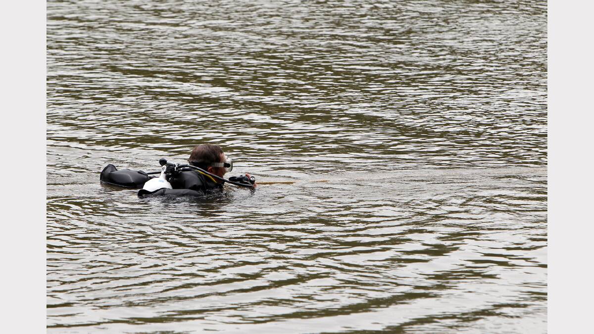 A VRA diver searches the water. 