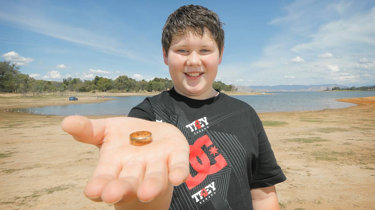 Aidan Allan shows the ring inscribed with the date 11-12, the same date as his 12th birthday. Picture: TARA GOONAN