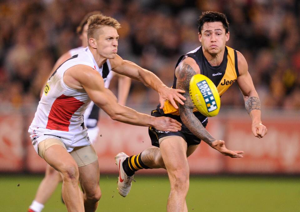 St.Kilda's Sean Dempster chases Richmond's Aaron Edwards at the MCG. Picture: FAIRFAX