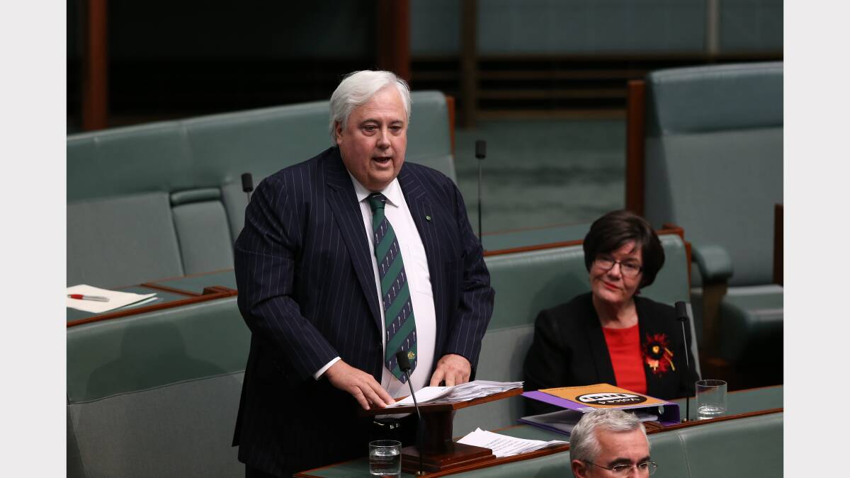 Clive Palmer gives his maiden speech alongside Cathy McGowan at Parliament House.