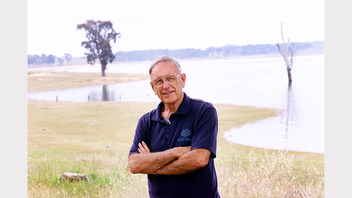 Ebden's John Hillier looking out over the weir from the Sandy Creek Rail Trail. (2001)