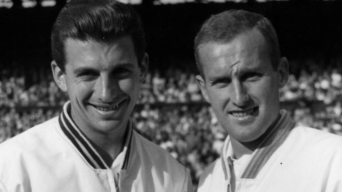 Neale Fraser (right) poses with Ashley Cooper (left) at the 1958 Wimbledon finals. 