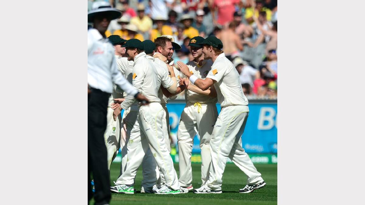  Ryan Harris celebrates with teamates after dismissing Ian Bell.