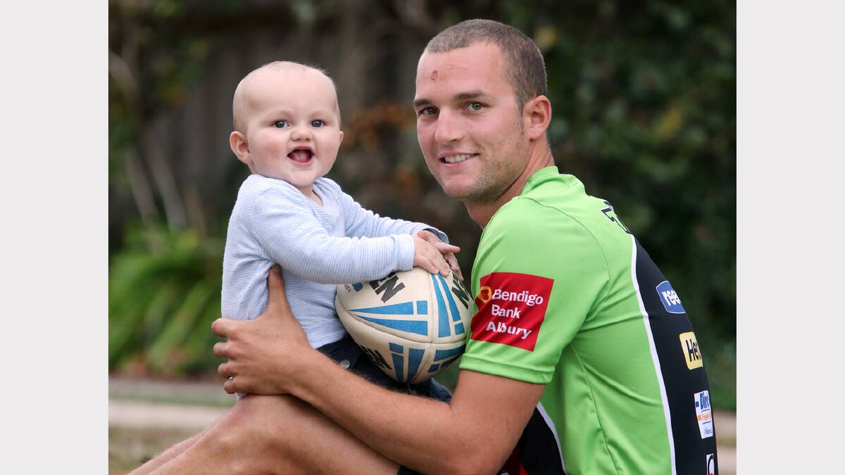 Thunder's Bryce Danhiez with his son Ryder, 7mths, who has been giving him a few pointers. Picture: PETER MERKESTEYN