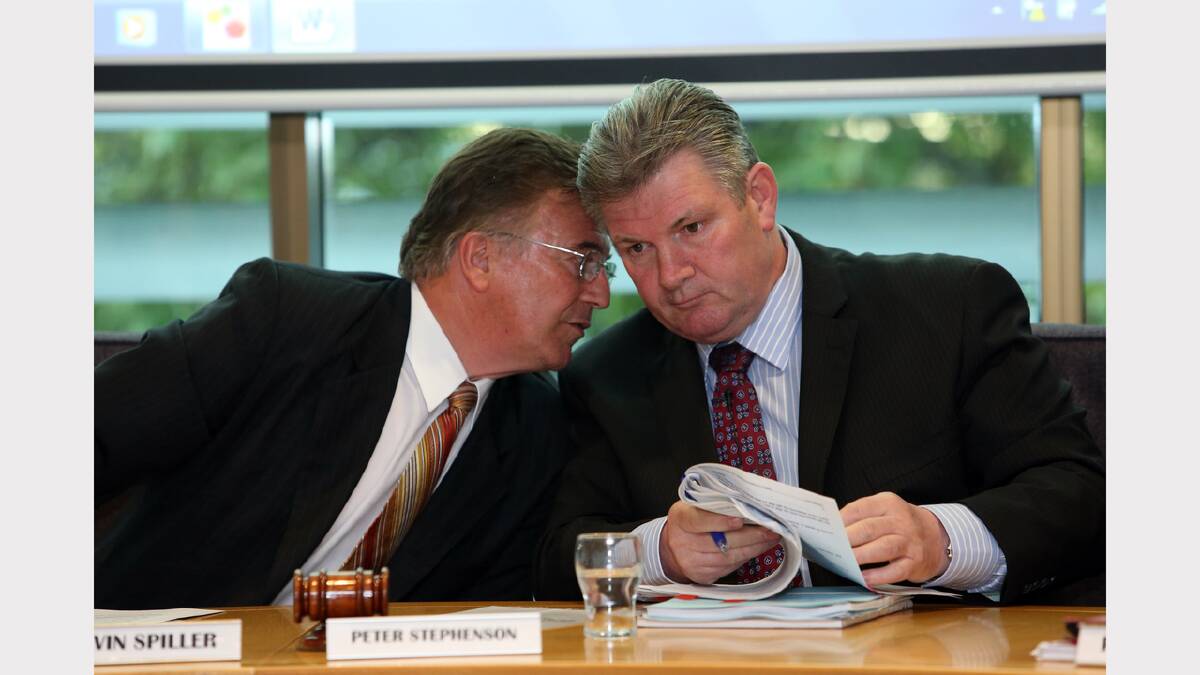  Interim chief executive Kelvin Spiller speaks to Wangaratta Council administrator Peter Stephenson during the first council meeting since the previous council was sacked.