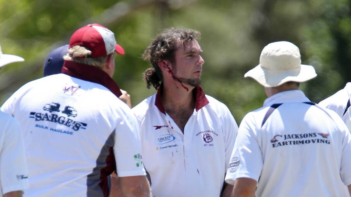 Wodonga batsman Clint De Bortoli received a fair hit to the side of the head after being caught in the line of a Ryan de Vries delivery.  Pictures: MATTHEW SMITHWICK
