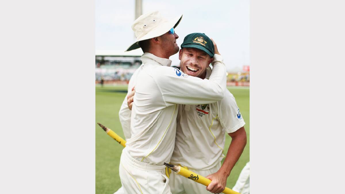  Michael Clarke and David Warner of Australia celebrate victory. Picture: GETTY IMAGES
