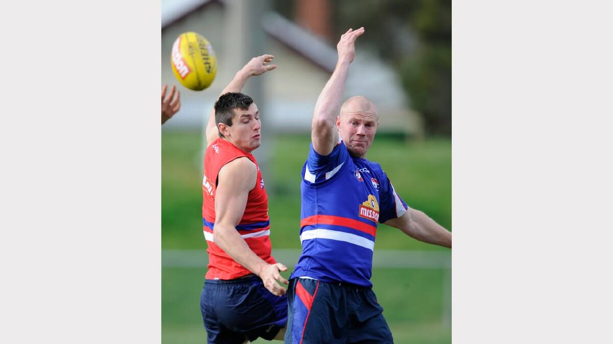 Western Bulldogs Barry Hall battles with James Mulligan during  training. Picture: FAIRFAX