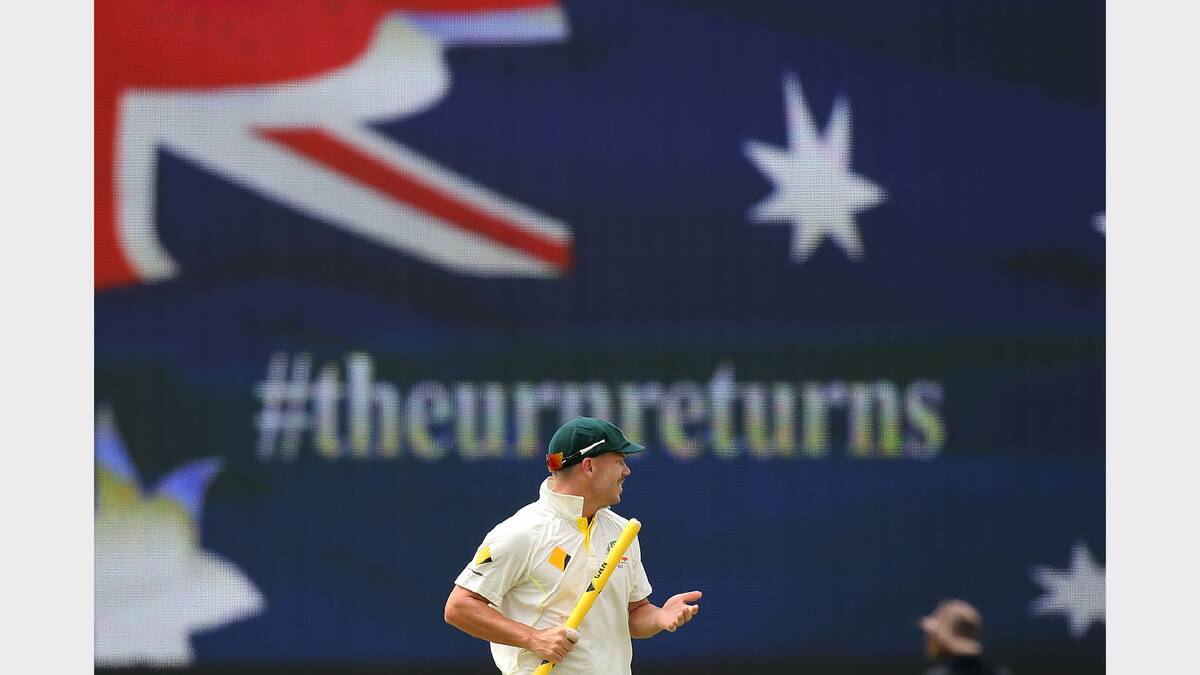 David Warner of Australia celebrates after defeating England and claiming a 3-0 series win on day five of the third Ashes test match. Picture: GETTY IMAGES
