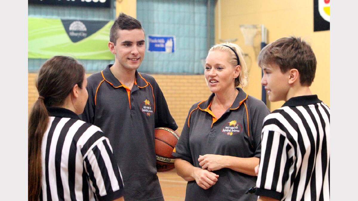 Referees Brendan lloyd and Natalie Donnelly coach the junior referees Maddie Jaruis and Liam Robb.