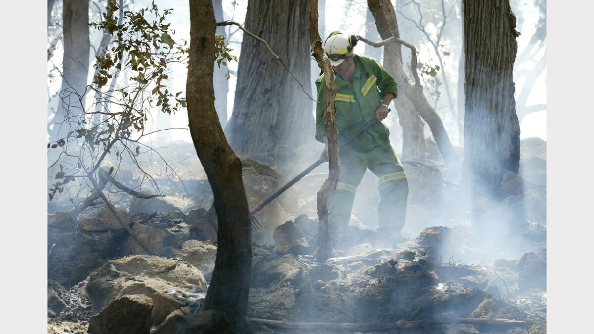 2006 February - DSE workers cleaning up after bushfires at Tatong