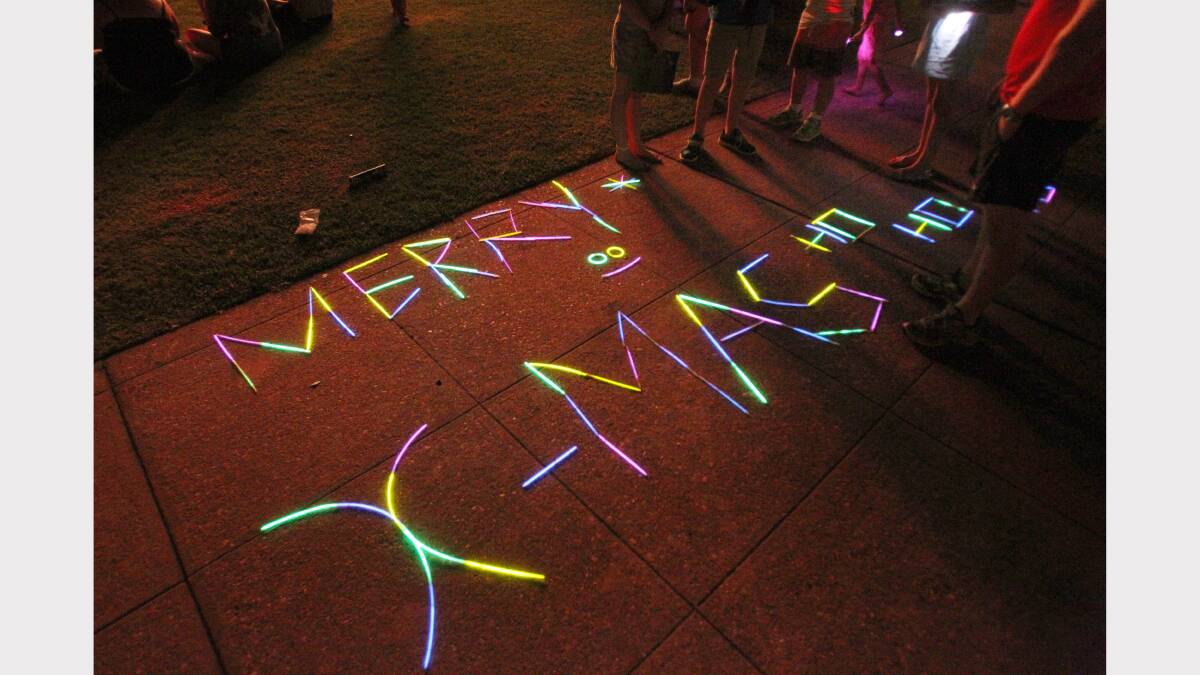   Children made messages with glow sticks. 