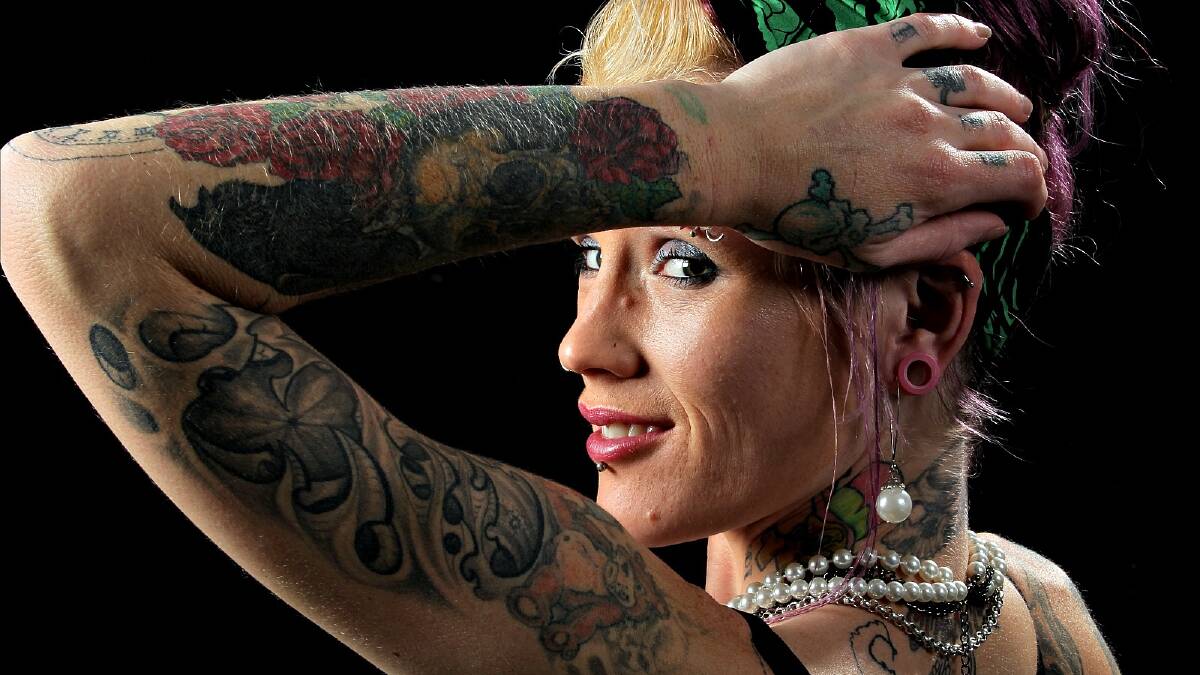 Sarah Fealy shows off some of her tattoos. Pictures: DAVID THORPE