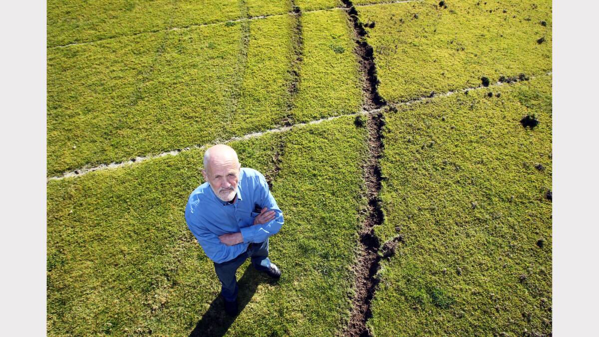 23. Cr David Thurley with burnout damage caused to turf at Norris Park Oval. Picture: MARK JESSER