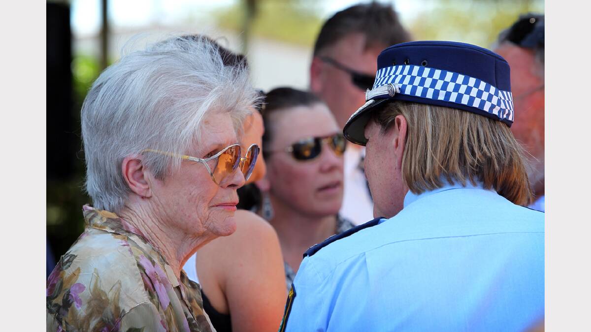  Supt. Beth Stirton speaks with June Howe at the memorial 