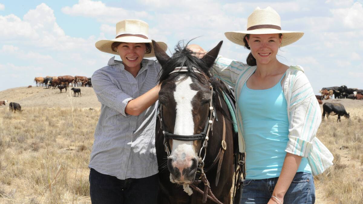 Kirby Johnstone and her sister Lexie Johnstone with their pet horse Zorro droving.