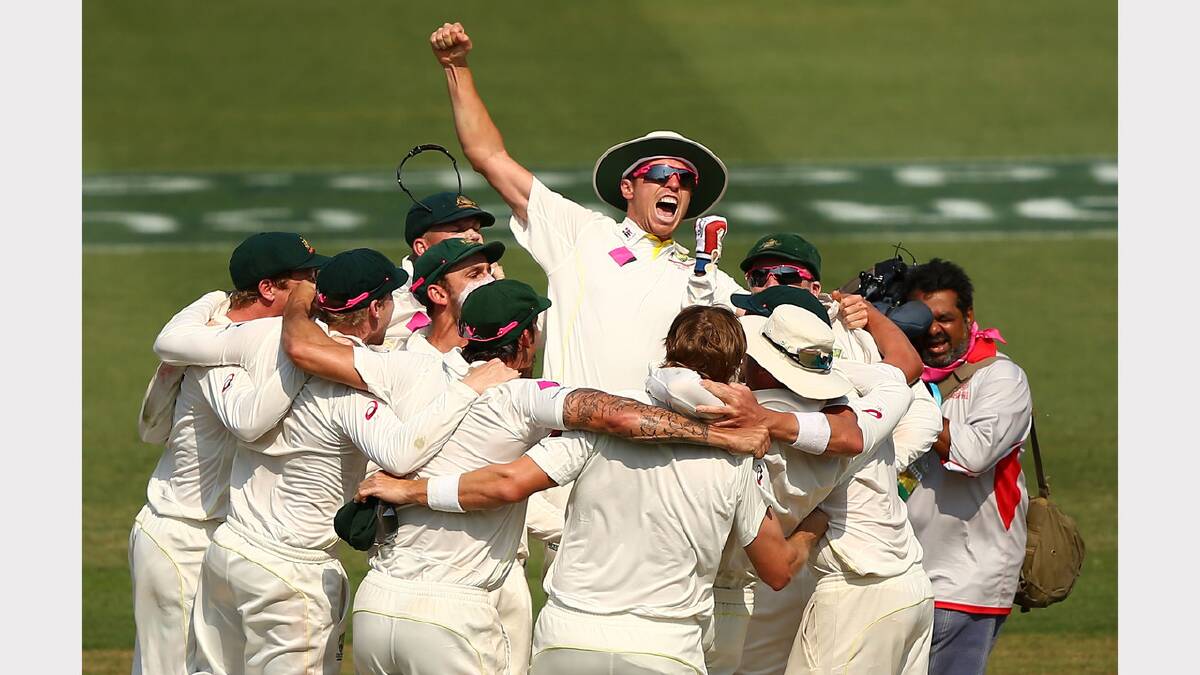 The Australian team celebrate the final wicket to Ryan Harris to win the series 5-0.