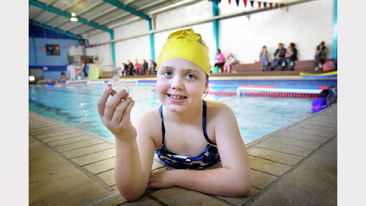 Brooke King, 6, appealing for donations to buy a special hearing aid she can use in the water.