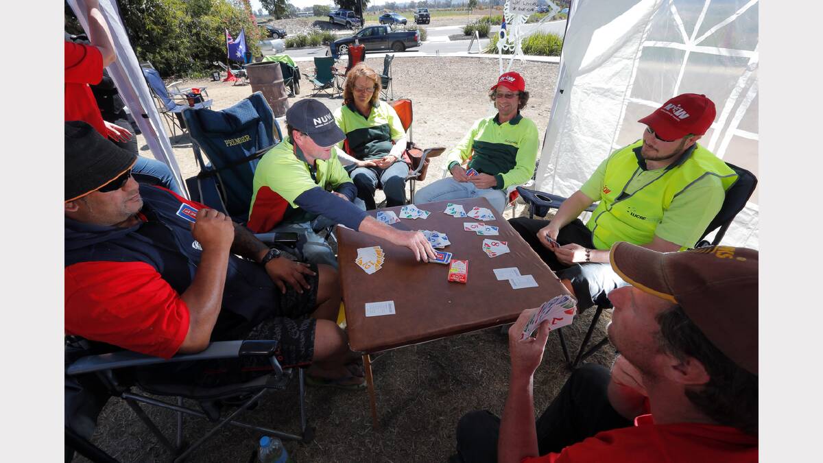 Striking staff played cards while waiting for the outcome of their latest negotiations. 