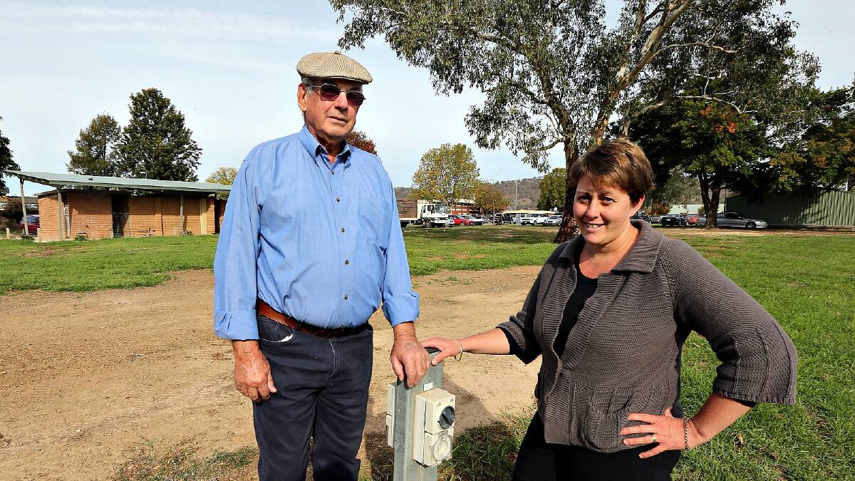Society president Len Hogan and Katrina Gollan seek a camping permit. Picture: PETER MERKESTEYN