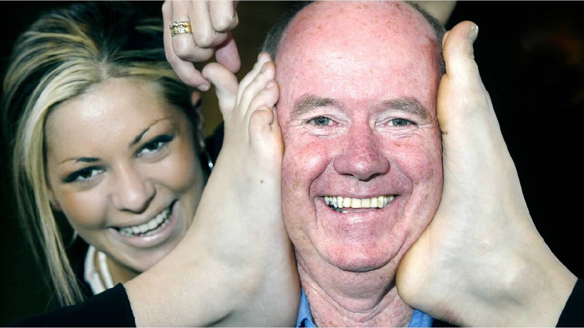 2004 - Clive Faul from Relay for Life got more than he bargained for by recruiting staff from the Tavern to enter the 24 hour charity event. Nicole Tyron squeezes the toes of her staff mates, Isabel Paton and Lauren O'Connell.