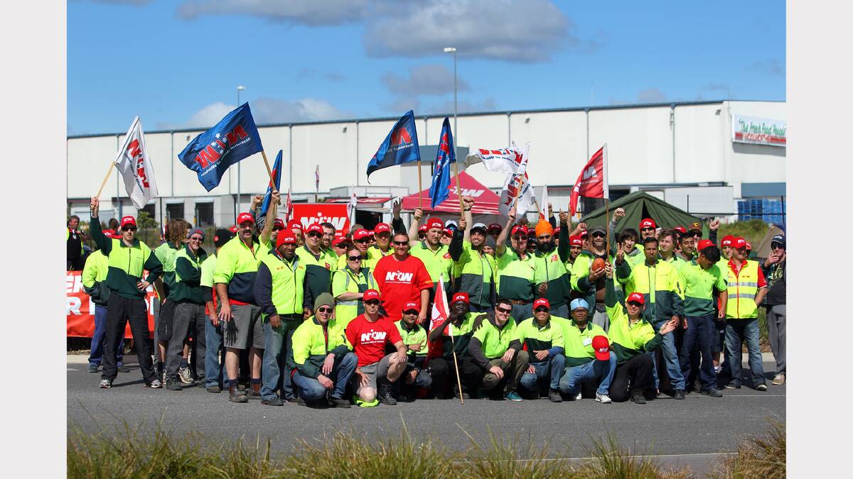 Workers on strike at the Woolwoths distribution centre. 