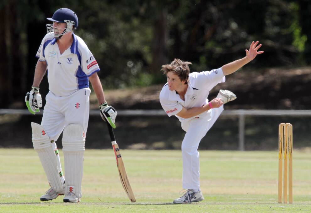 Yackandandah batsman Mick Barnard gets ready to run as Kiewa bowler Jason Bartel lets one fly.