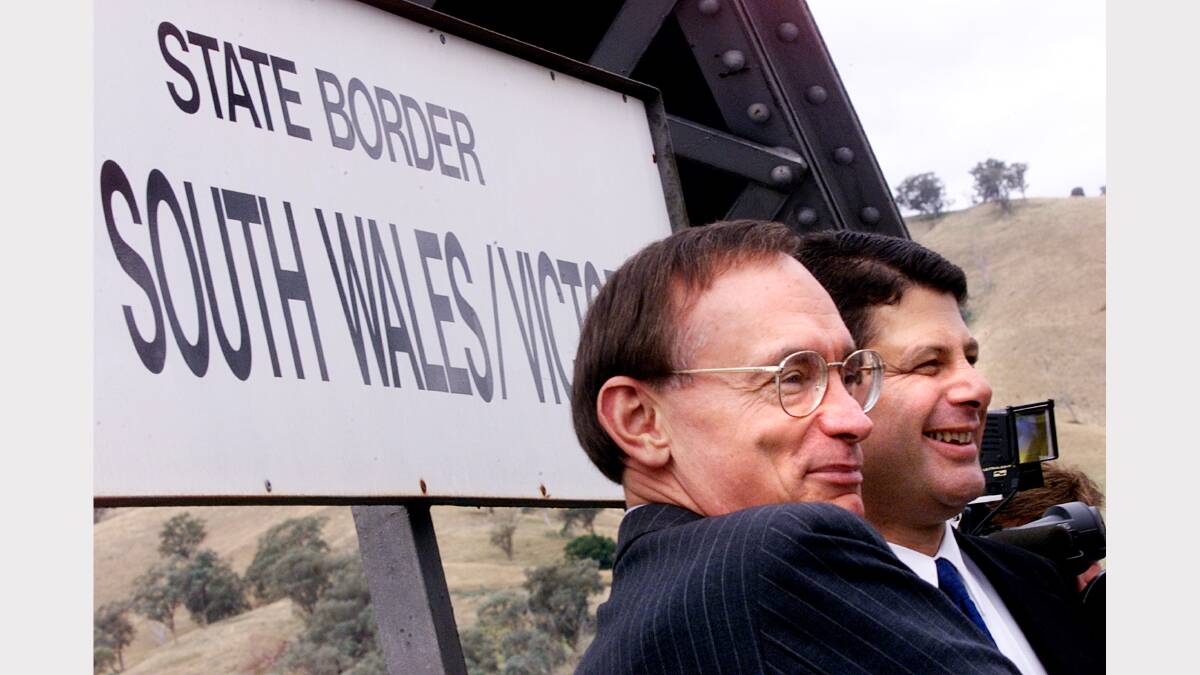 2001 - NSW premier Bob Carr and VIC premier Steve Bracks at the state borders.